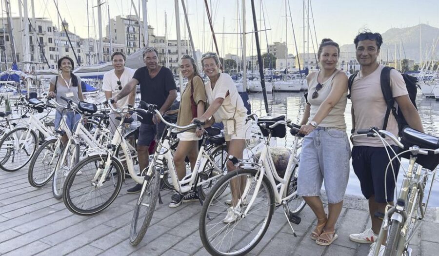 Palermo: Guided Bike Tour with Street Food Tasting - Waterfront cruising and Port of Cala: sea views with context