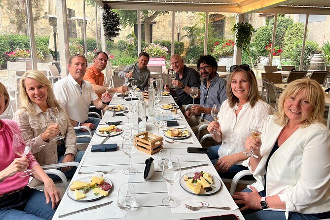 Private Sicilian Wine & Cheese Tasting - The tasting table: 5 cheeses, ham, and a sweet finish that actually makes sense